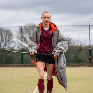 Image showing model warming up after playing hockey